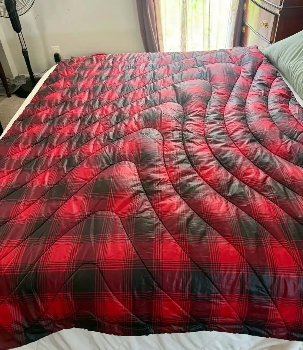 Rumpl Puffy Sherpa Fleece Reversible Travel Blanket in Red and Black